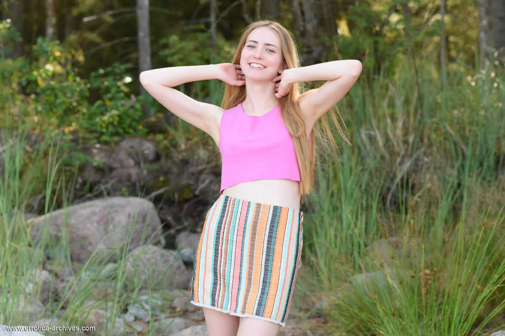 Barefoot young girl Lena Flora gets totally naked on a boulder in nature while spreading her perfect teen body. - Lena Flora