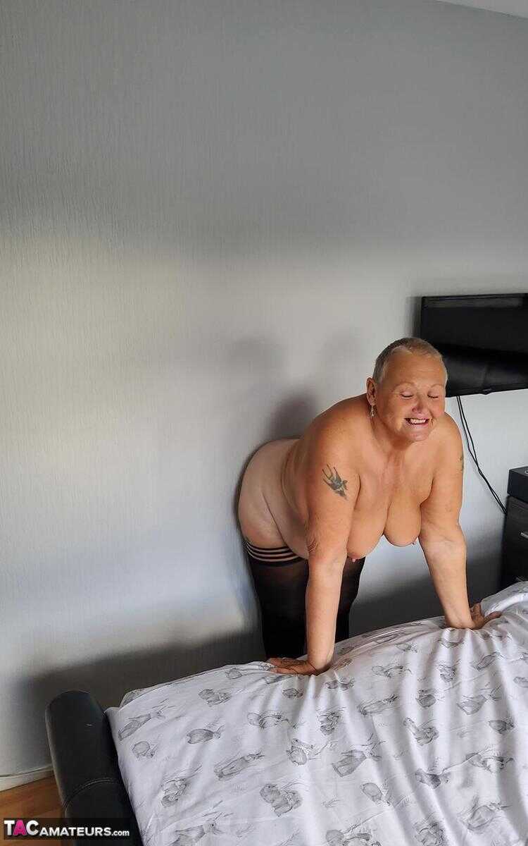 Huge boobs, sagging skin and a shaved pussy: Overweight granny Valgasmic Exposed bares it all in her lingerie and hosiery....