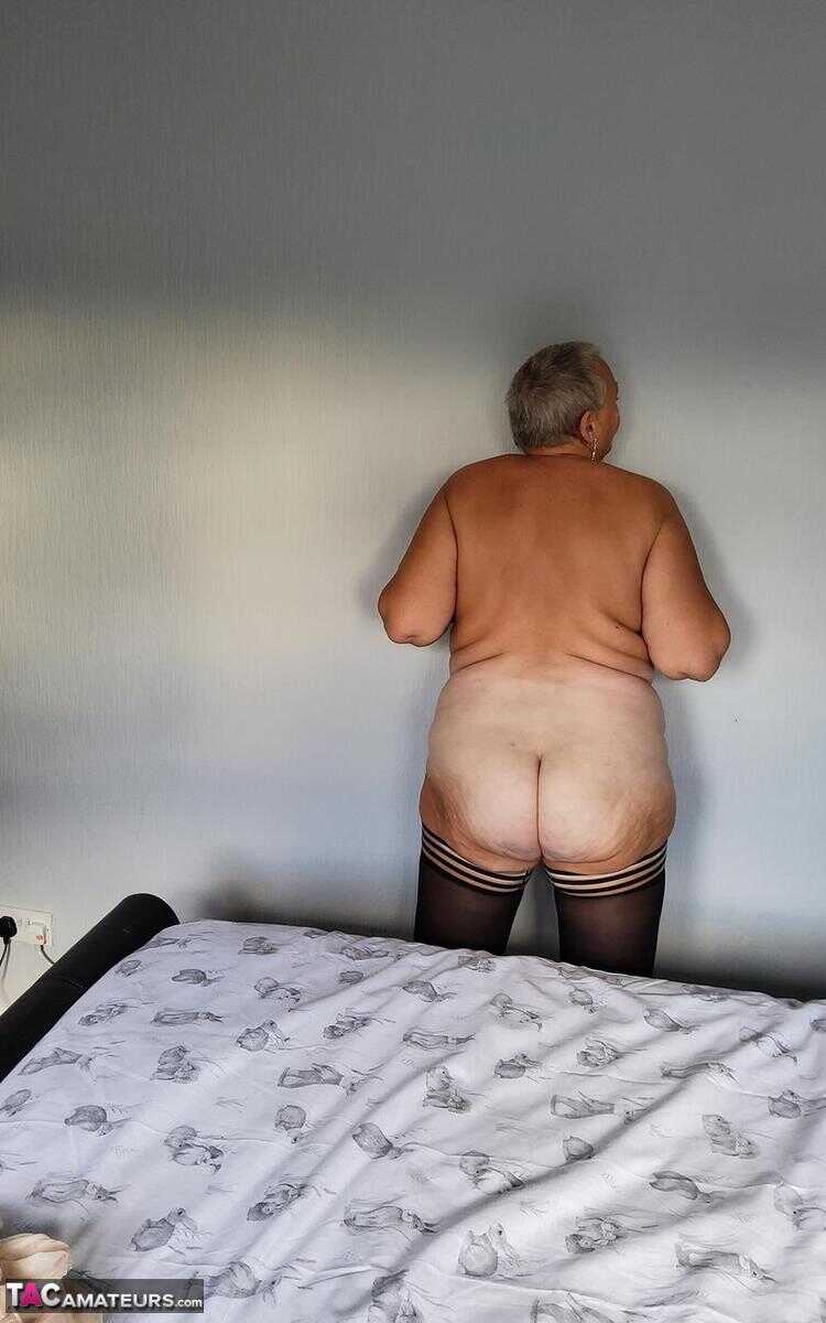 Huge boobs, sagging skin and a shaved pussy: Overweight granny Valgasmic Exposed bares it all in her lingerie and hosiery....