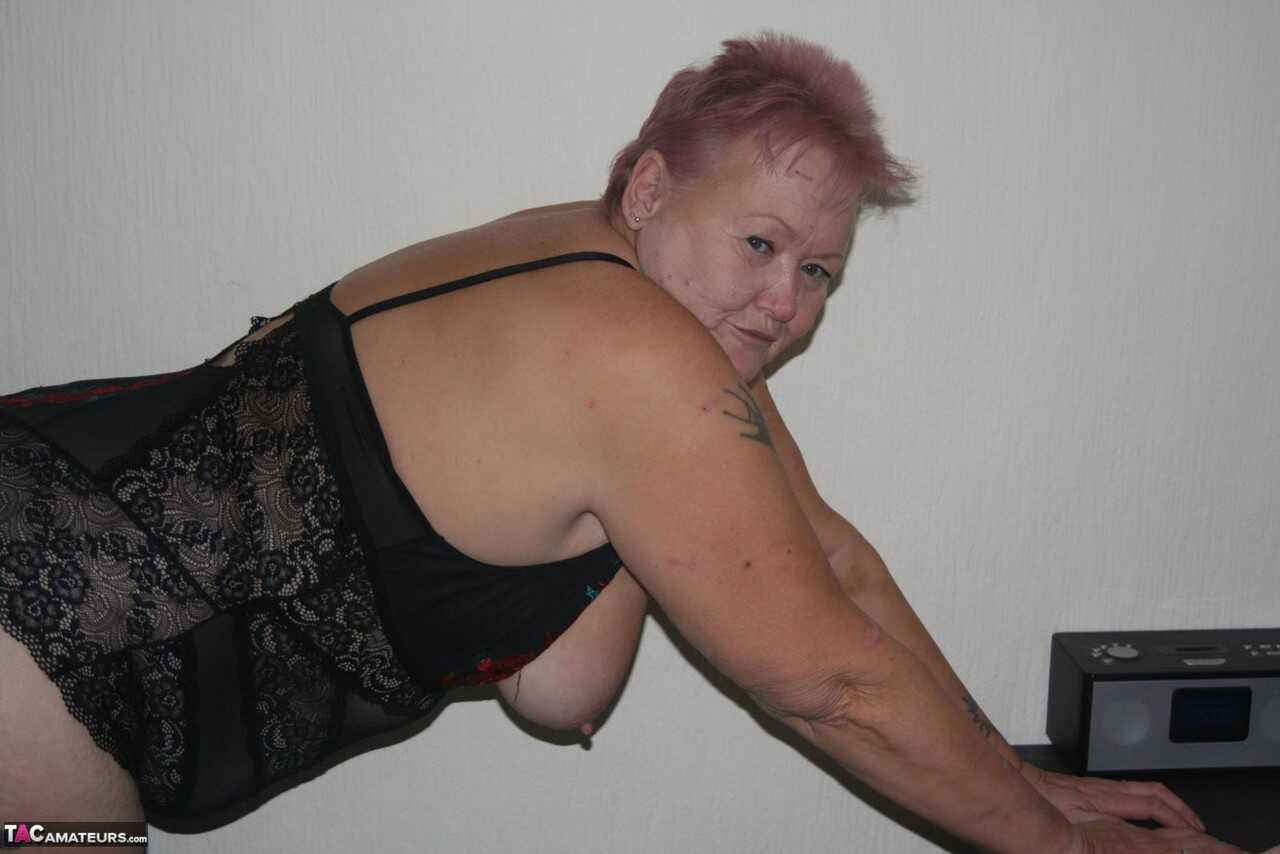 Huge boobs, sagging skin and a shaved pussy: Overweight granny Valgasmic Exposed bares it all in her lingerie and hosiery....