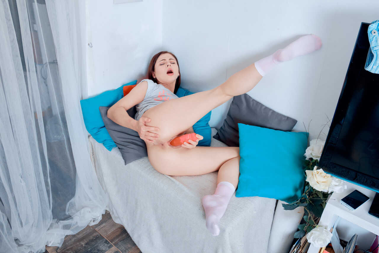 Erika's Vibrant Adventure: Young Renter Sticks a Toy in Her Pussy and Ass - Erika Korti