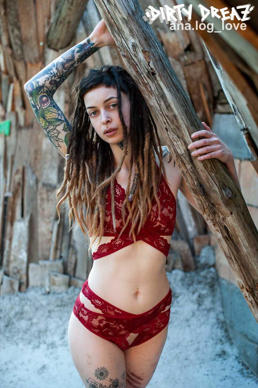 Tattooed female bodybuilder with dreadlocks gets naked in the woods for a solo show - Cutz