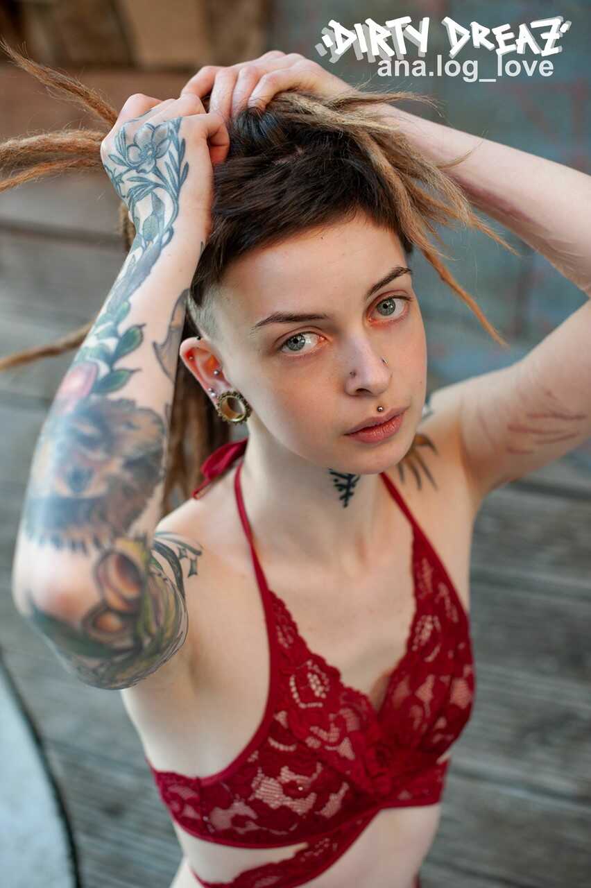 Tattooed female bodybuilder with dreadlocks gets naked in the woods for a solo show - Cutz