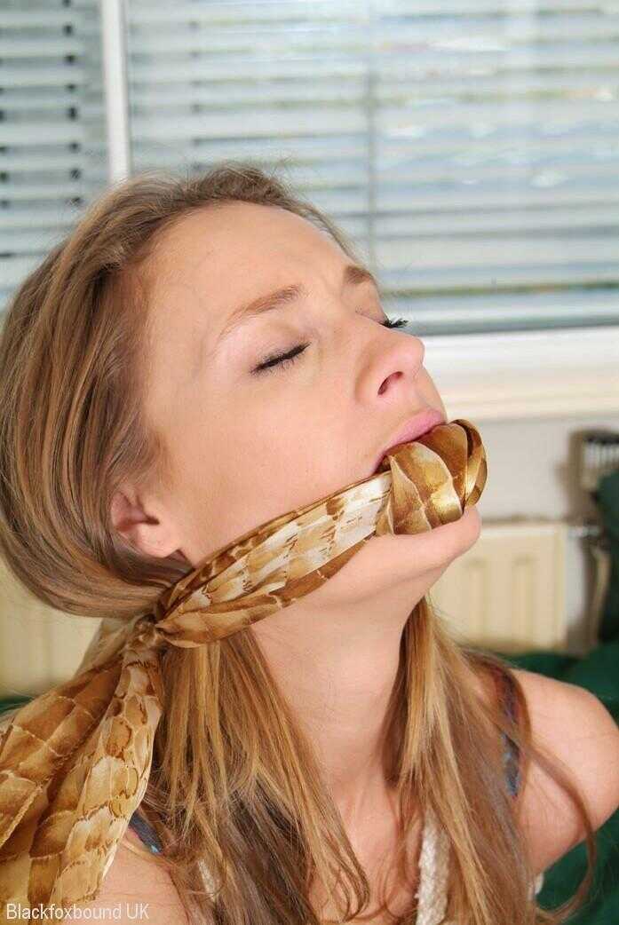 Katie C's Pretty Bindings: A Caucasian Girl Gagged and Tied on a Bed in Her Lingerie - Katie C