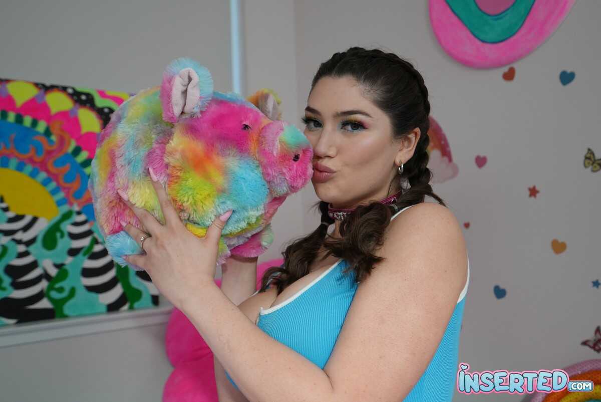 Busty brunette Alyx Star uncovers her big tits and hairy pussy while getting bare naked for the first time! - Alyx Star