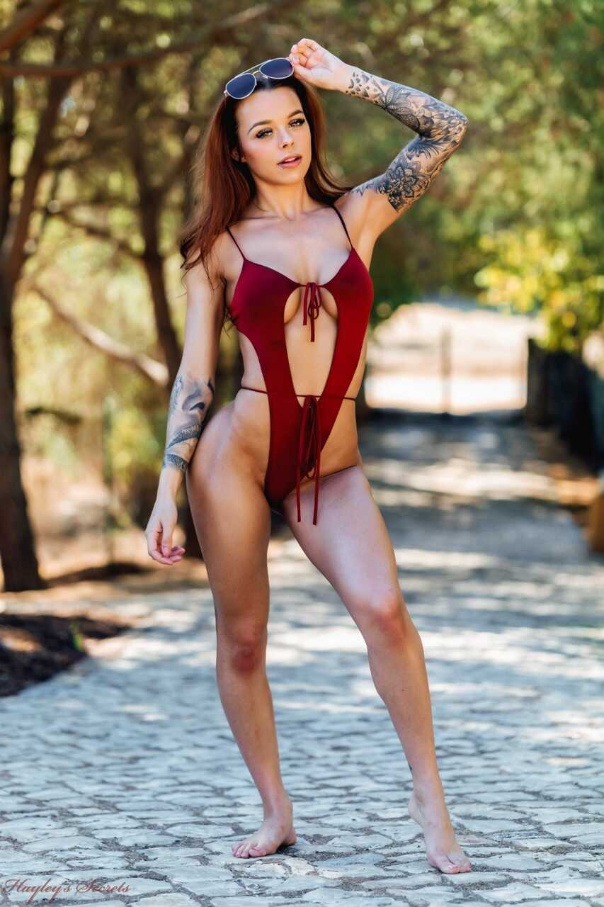 Red hot nudity in the sun! Mia Stryker's tattoos shine as she stands nude on the beach - Mia Stryker