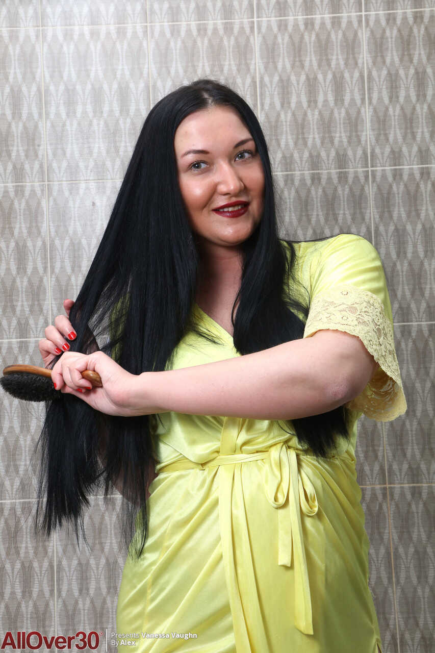 Curvy 30 plus brunette Vanessa Vaughn brushes her long hair before bathing and getting naughty with her chubby Asian lover...