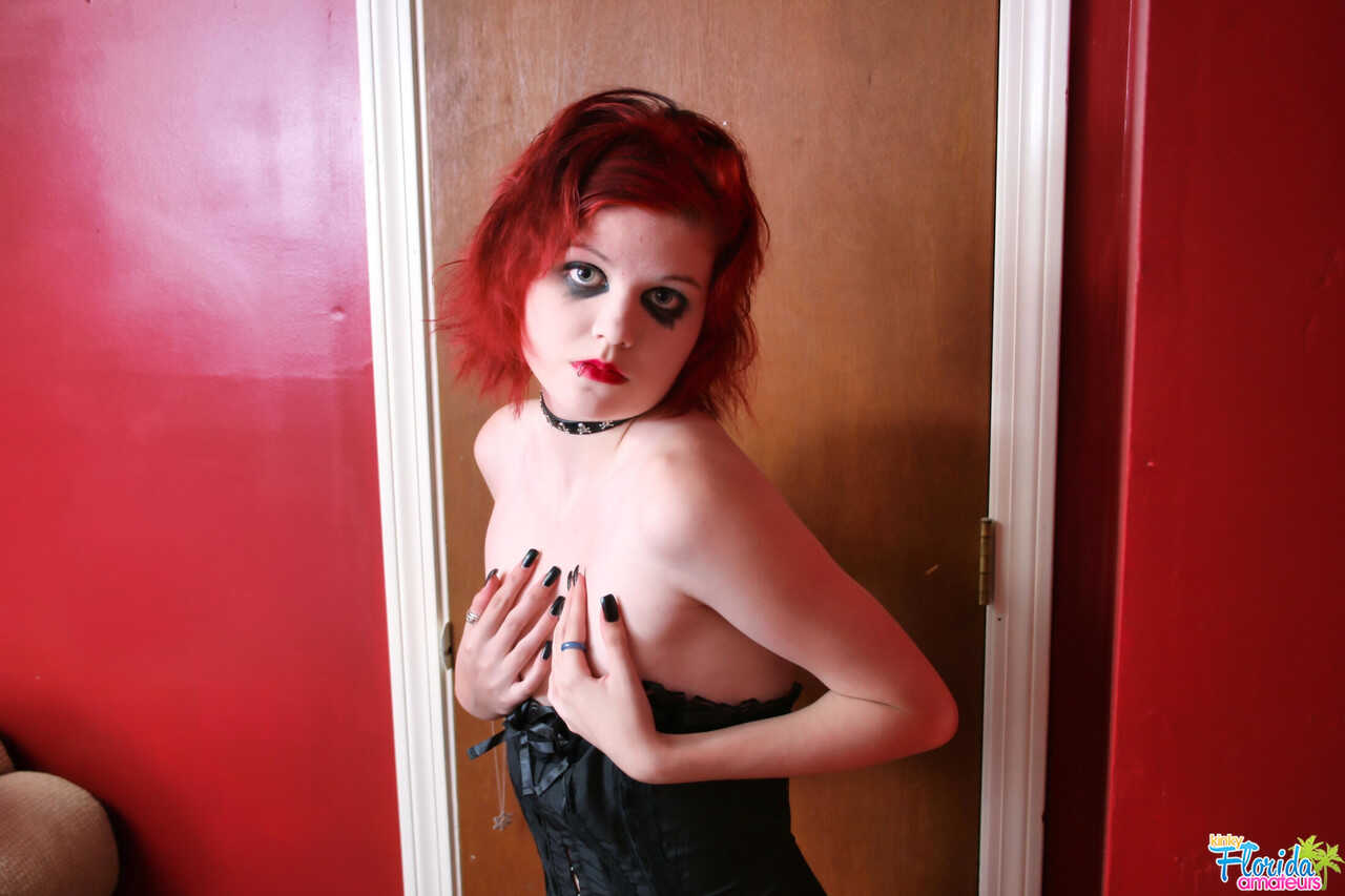 Teen Goth Redhead Satine Unleashes Her Perky Boobs From A Corset!