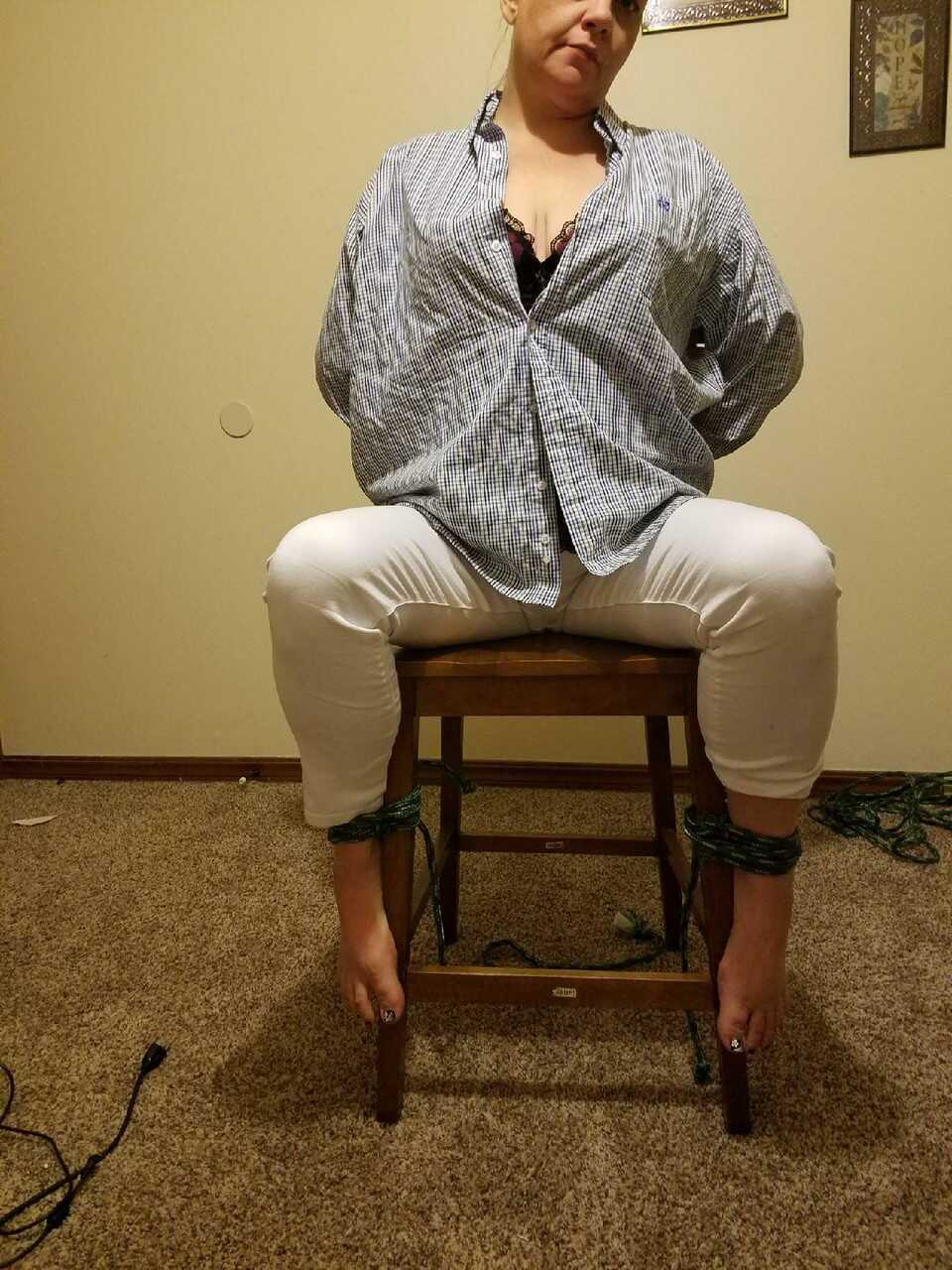 Caught in the act: Pretty Caucasian female's bare feet get spotted while she's tied up and exposed - 