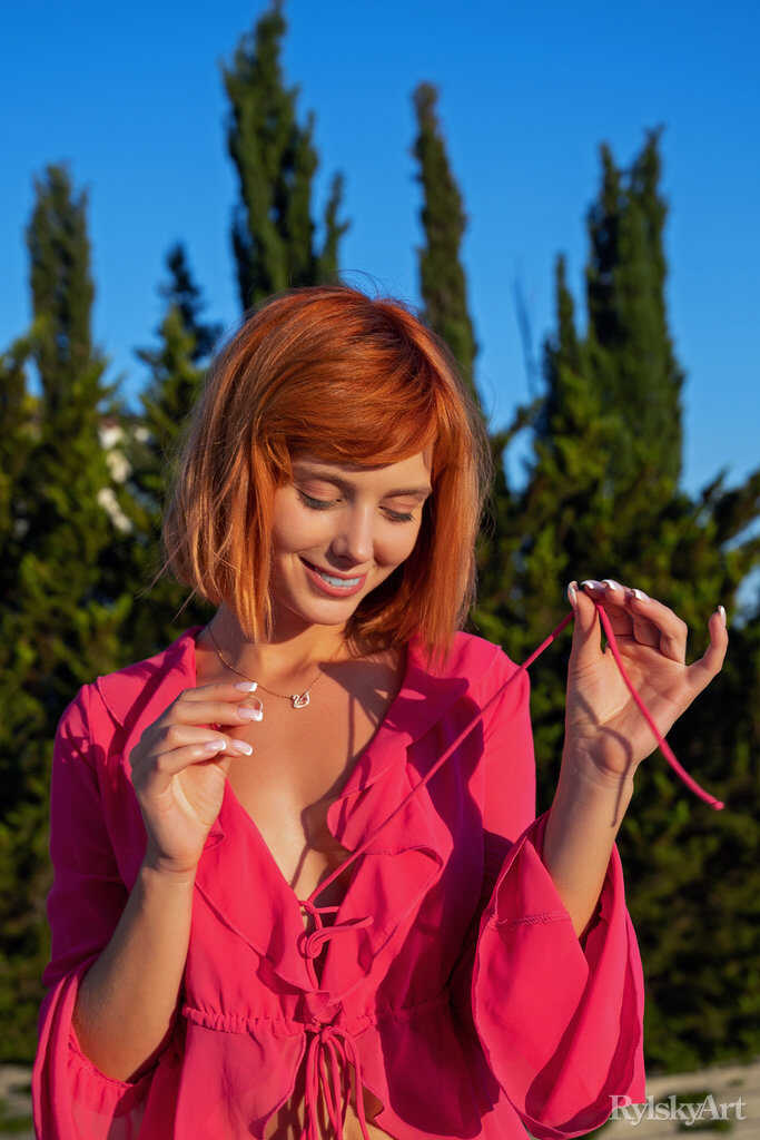 Redhead Marta Unleashes Her Sexy Bod on the Balcony