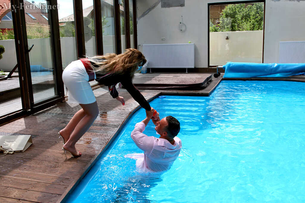 Dirty Couple Fucks in the Pool While Keeping Their Clothes On