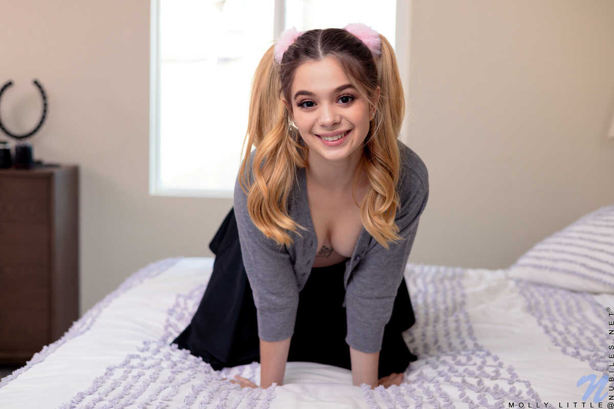 Cute young girl Molly Little finger spreads her pussy in pigtails while wearing teen high heels and showing off her tight ...