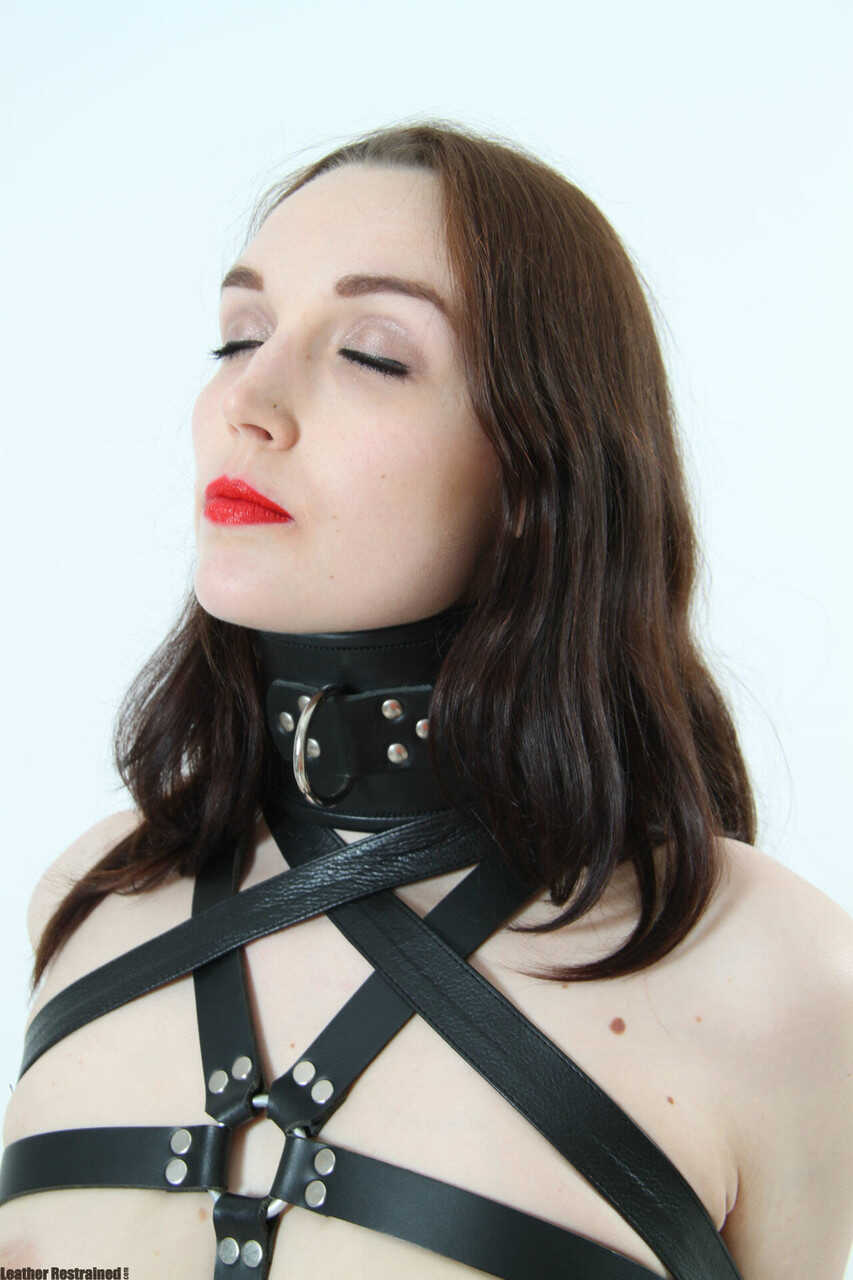 Sexy submissive in leather heels gets tied up and teased by her dominant master - 