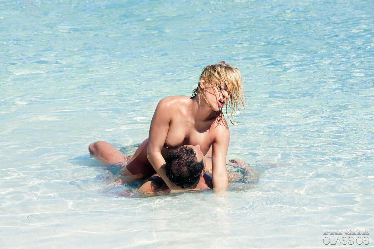 Sexy blonde Britney's vintage big tits take a dip in the ocean before her sexy anal sex with George Uhl on the beach ...