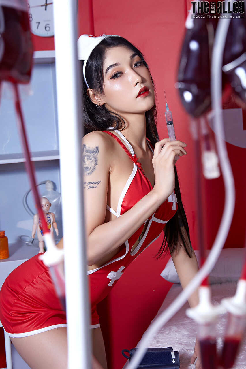Asian Invasion: Poppy the Naughty Nurse Strips Down for Her Patient's Pleasure - Poppy