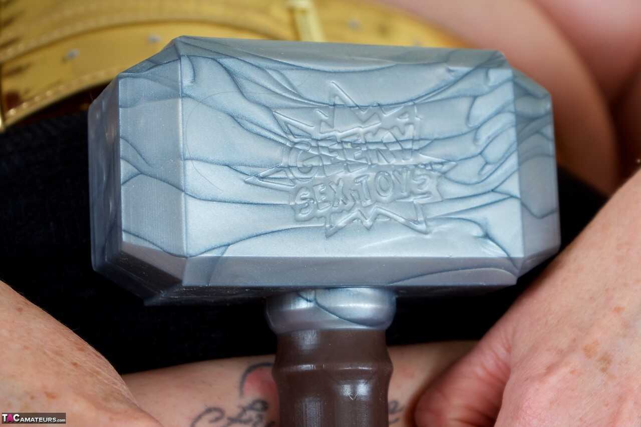 Auntie Trisha's Naughty Secret: Masturbating with a Sex Toy in Nylons and Black Boots While Shaving Her Mature Spread...