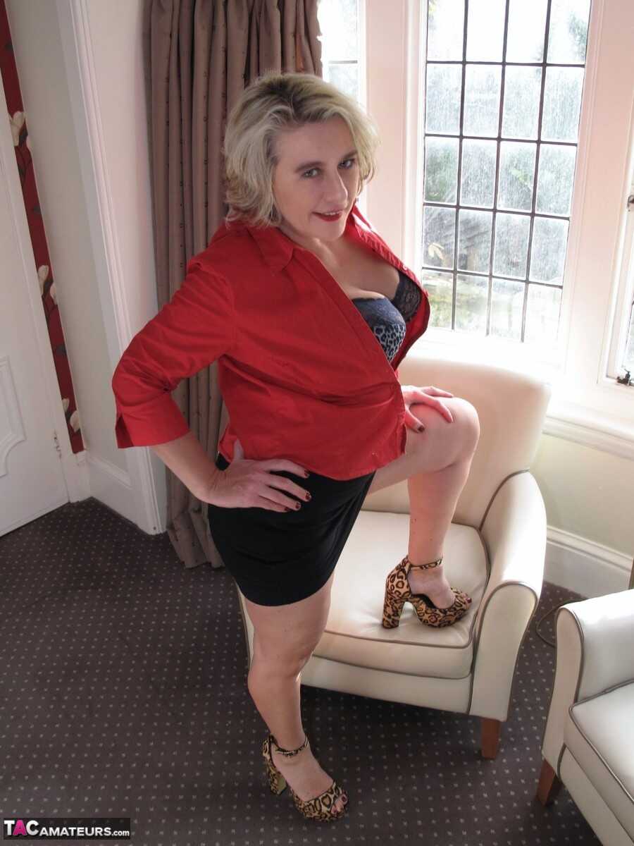 Caught in the Act! Mature Blonde Busts Out of Her Black Miniskirt During Solo Play - Camilla Creampie