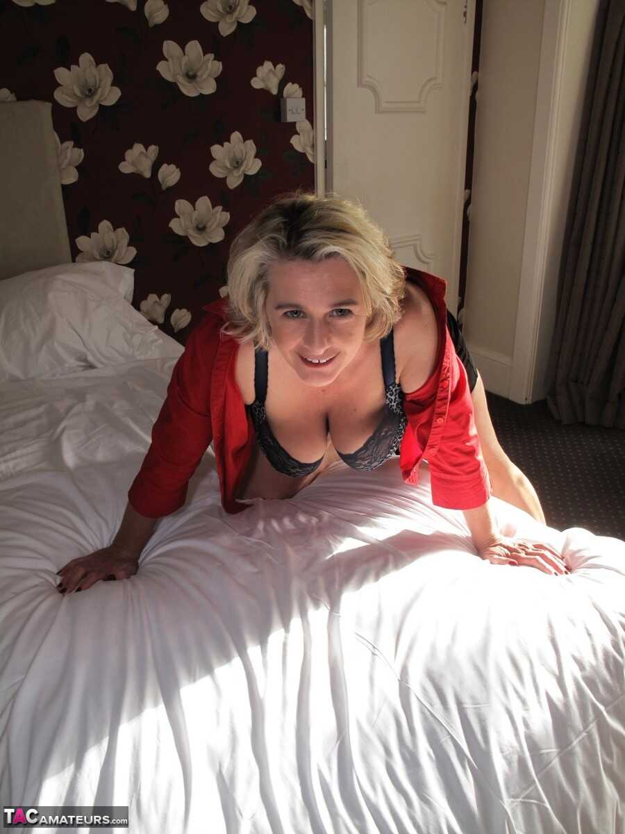 Caught in the Act! Mature Blonde Busts Out of Her Black Miniskirt During Solo Play - Camilla Creampie
