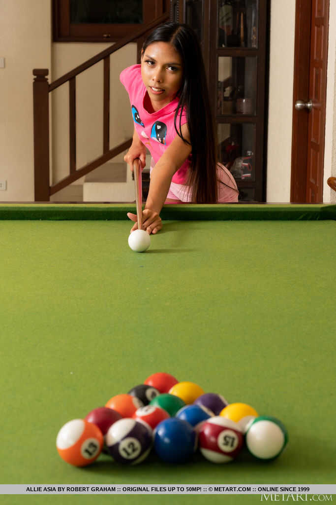 Slim Thai girl Allie Asia gets totally naked while shooting pool and shows her beautiful shaved Asian pussy and tiny asian...