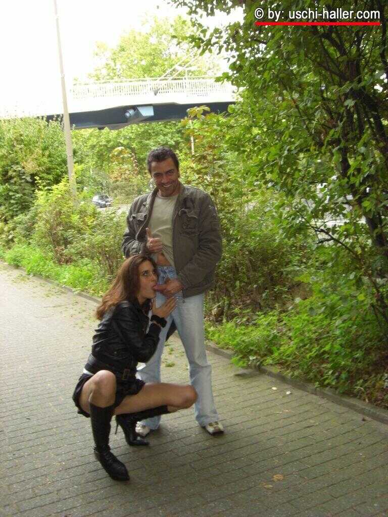 German thigh high boot-loving couple Berichte and Danny have sex on a footpath over a roadway while getting caught in the ...