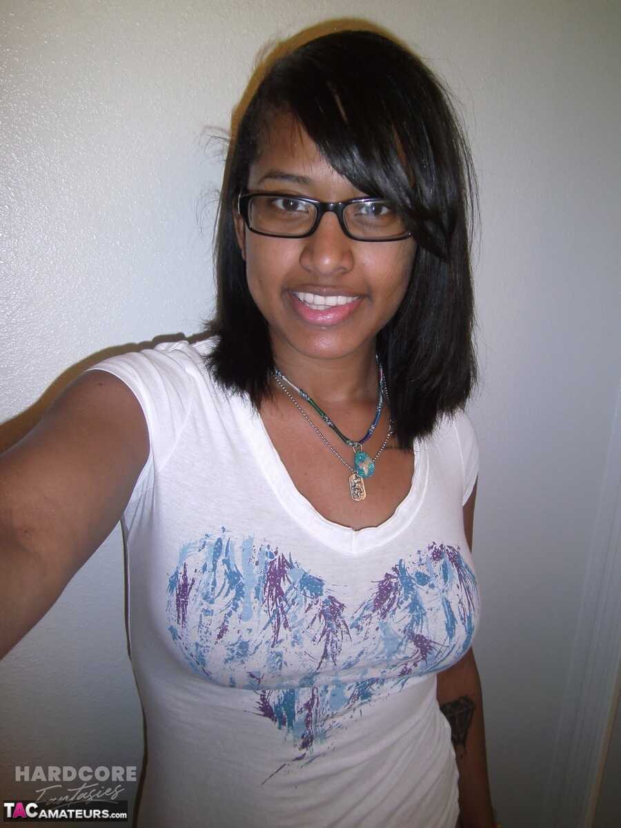 Uncovered Heaven: A Selfie with Natural Tits and Shaved Pussy by an Ebony Amateur on a Bended Knees - Heavenly Smut