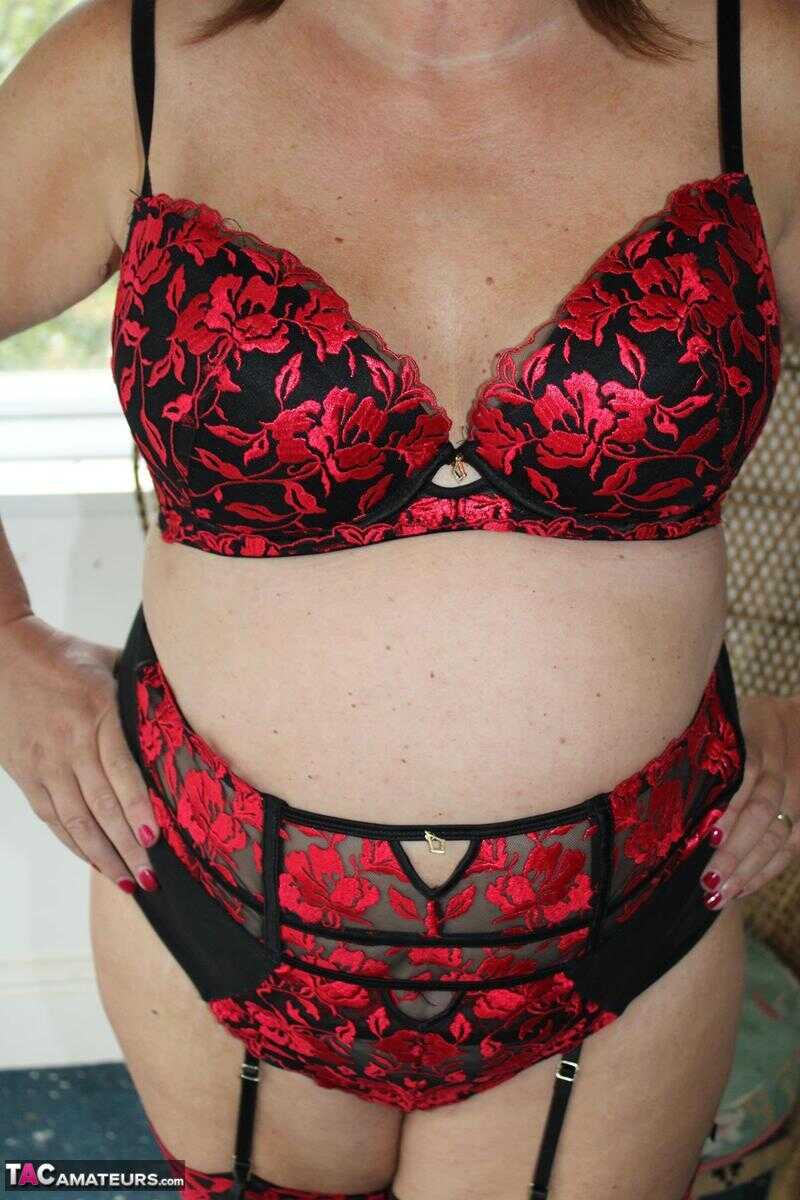 Mature British plumper Cassandra Uk models lingerie and nylons as well.