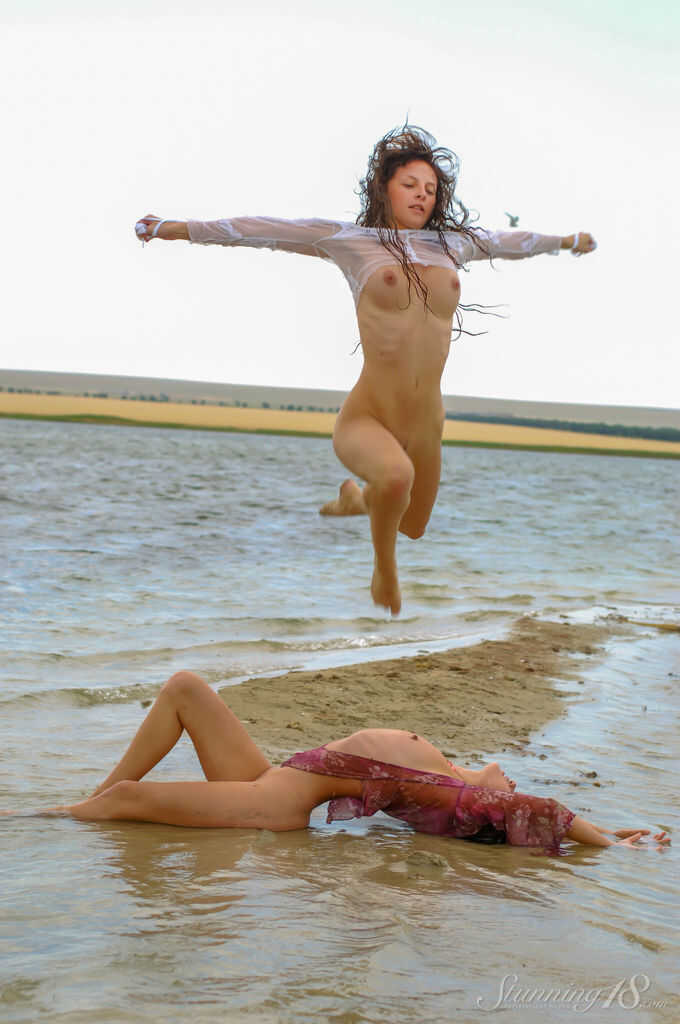 Teen Lesbians Sophronia Q & Aglaia X Frolic About In Shallow Water, Lustful Encounter With Rippling WavesExplore more ...