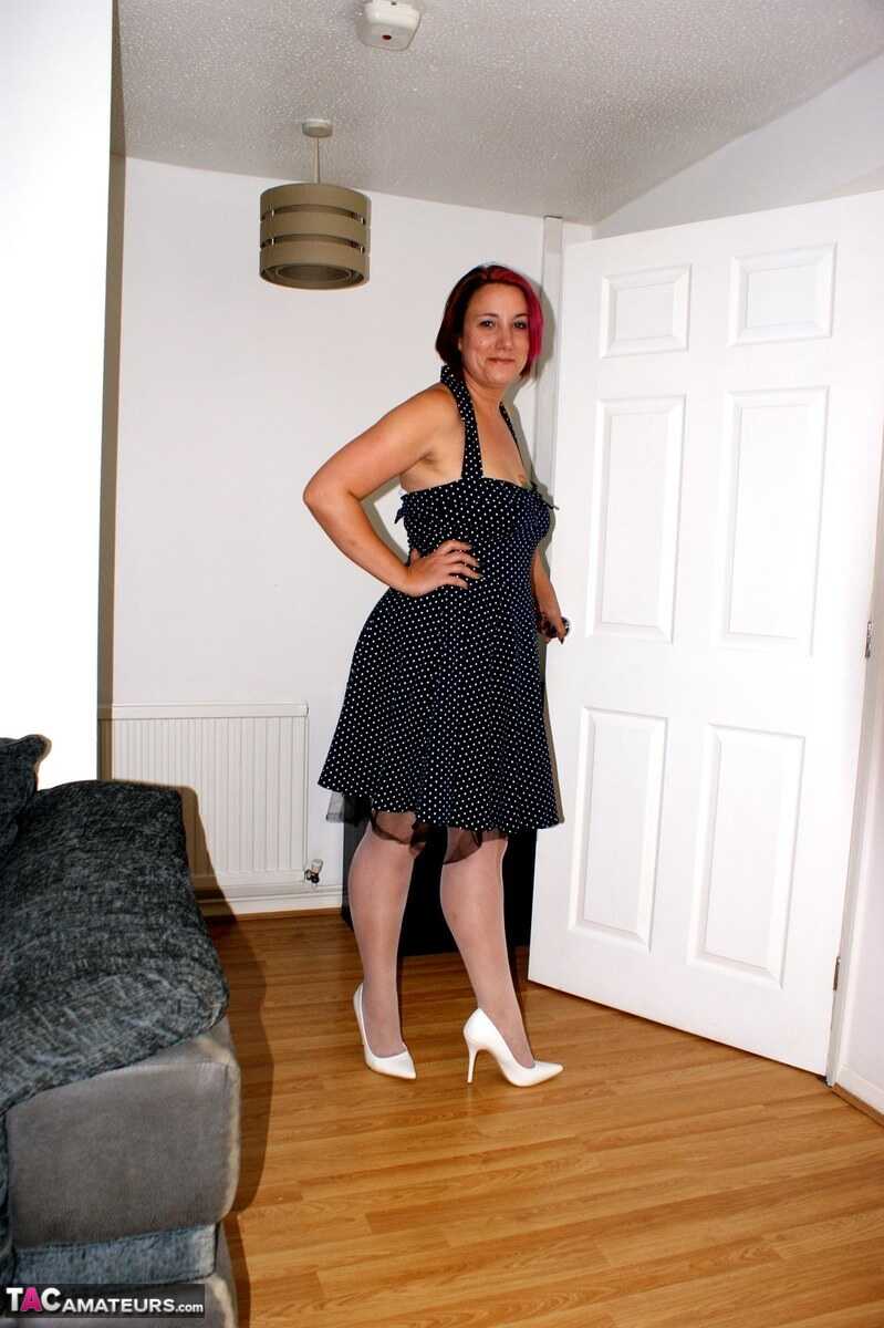 Redhead Sara's Nylon Fantasy: Older MILF in White Stockings Teases and Pleasures Herself at Home - Sara Banks