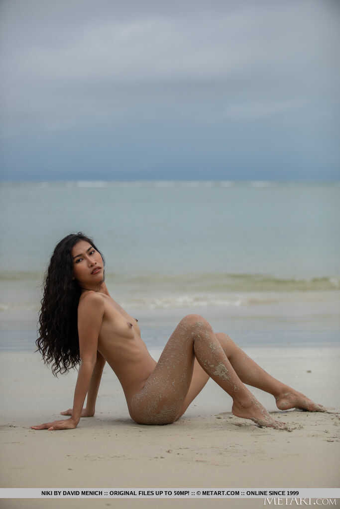 Niki, the hot brunette teen strips off her bikini on the Teen Beach, leaving nothing to the imagination! - Niki