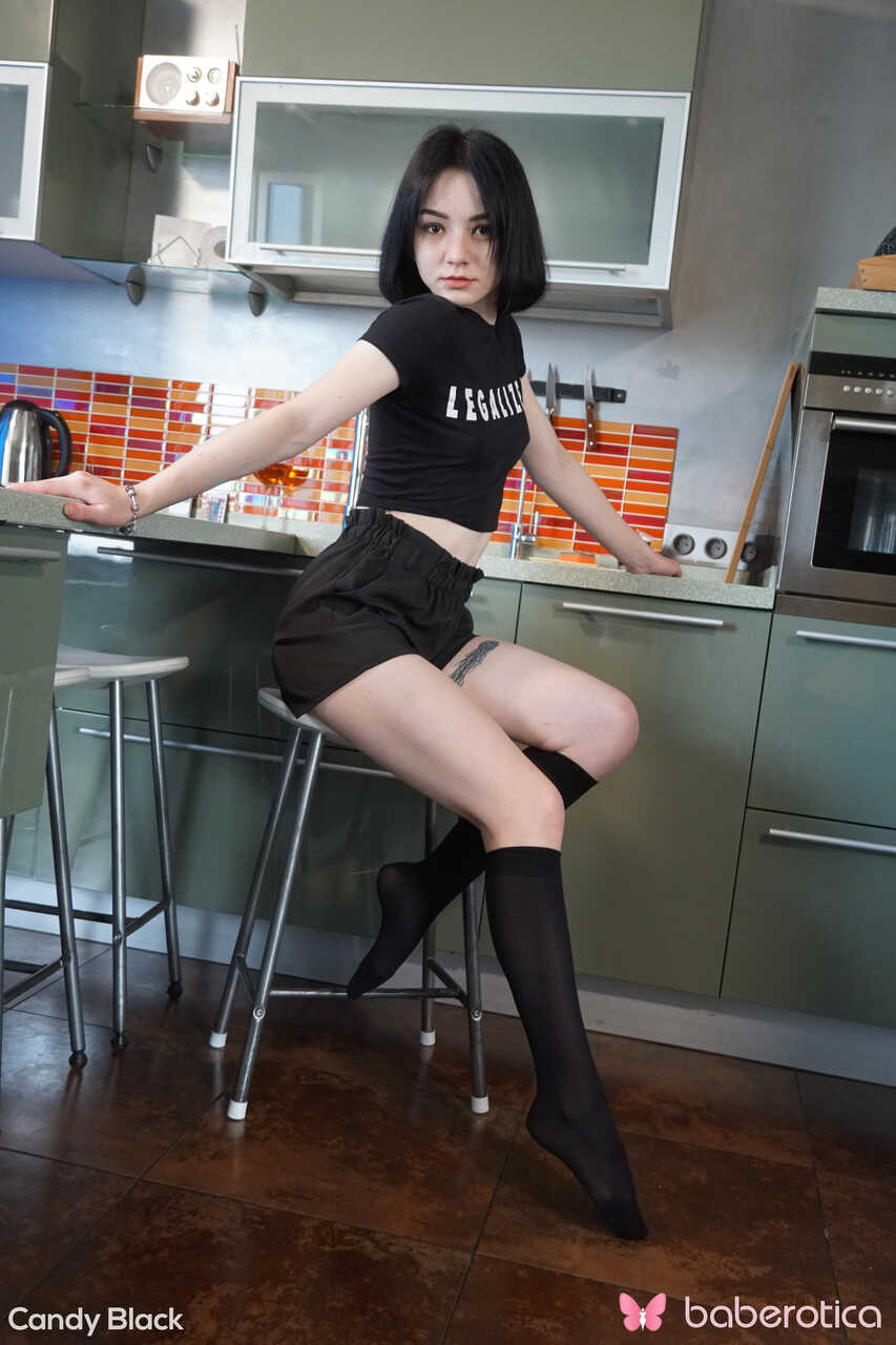 Dark haired teen Candy Black masturbates with a vibrator in black knee socks - Candy Black