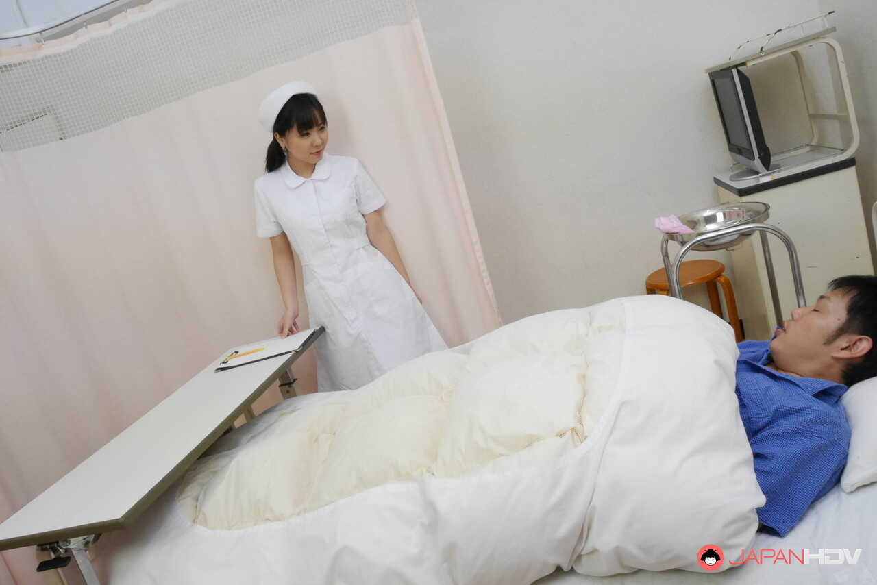 Japanese nurse Miyuki Ojima takes care of her patient's urgent needs with a blowjob and a handjob, leaving him covere...