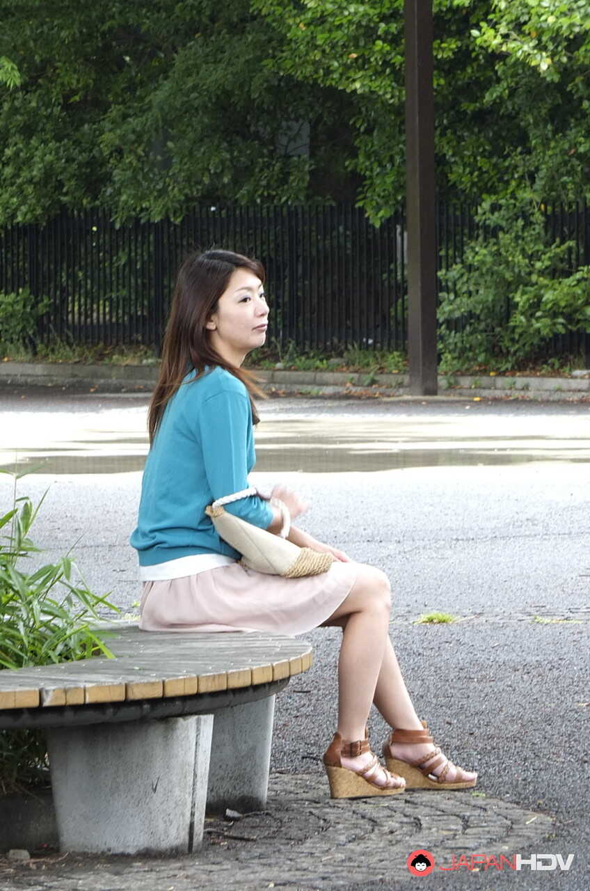 Japanese MILF Tomomi Matsuda Gives a Blowjob in a Public Bathroom before Teasing with Her Upskirt - Tomomi Matsuda