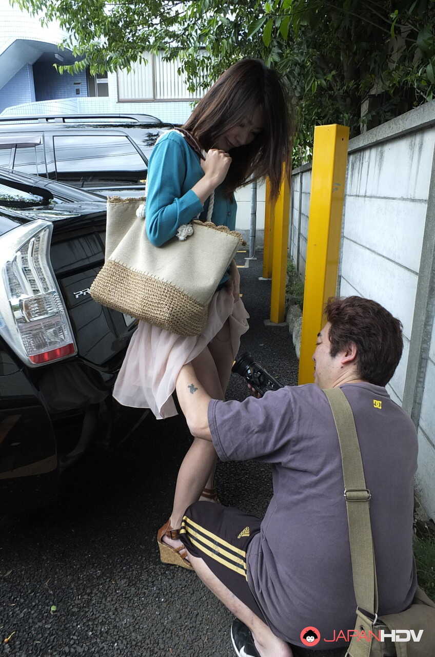 Japanese MILF Tomomi Matsuda Gives a Blowjob in a Public Bathroom before Teasing with Her Upskirt - Tomomi Matsuda