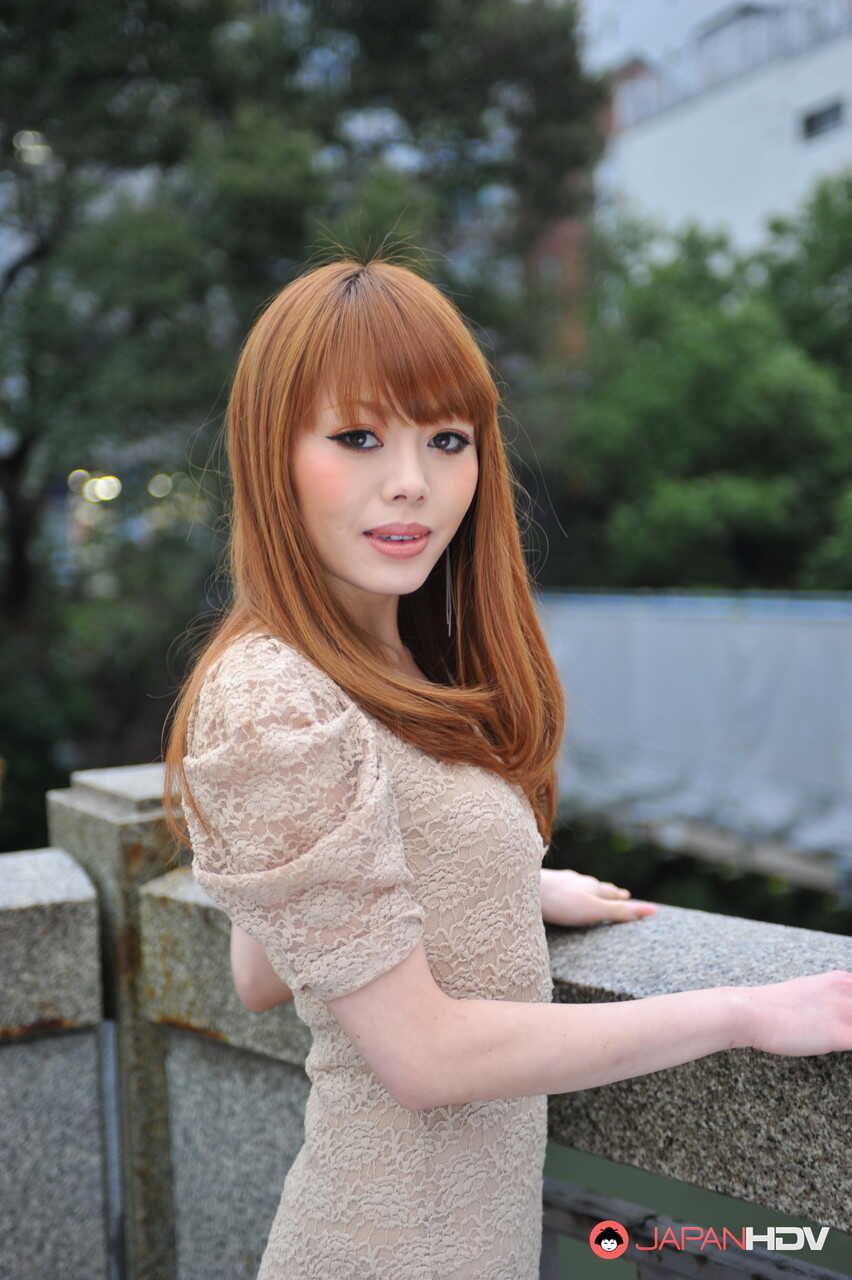 Japanese Redhead Reika Kitahara Exposes Her Sexy Curves in the Streets