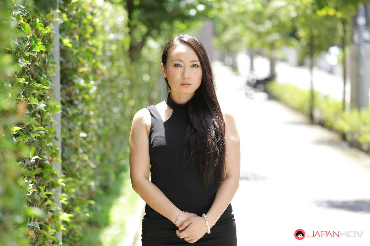 Public flashing with hot Japanese beauty Aya Shiina in a short black dress on a city street - Aya Shiina