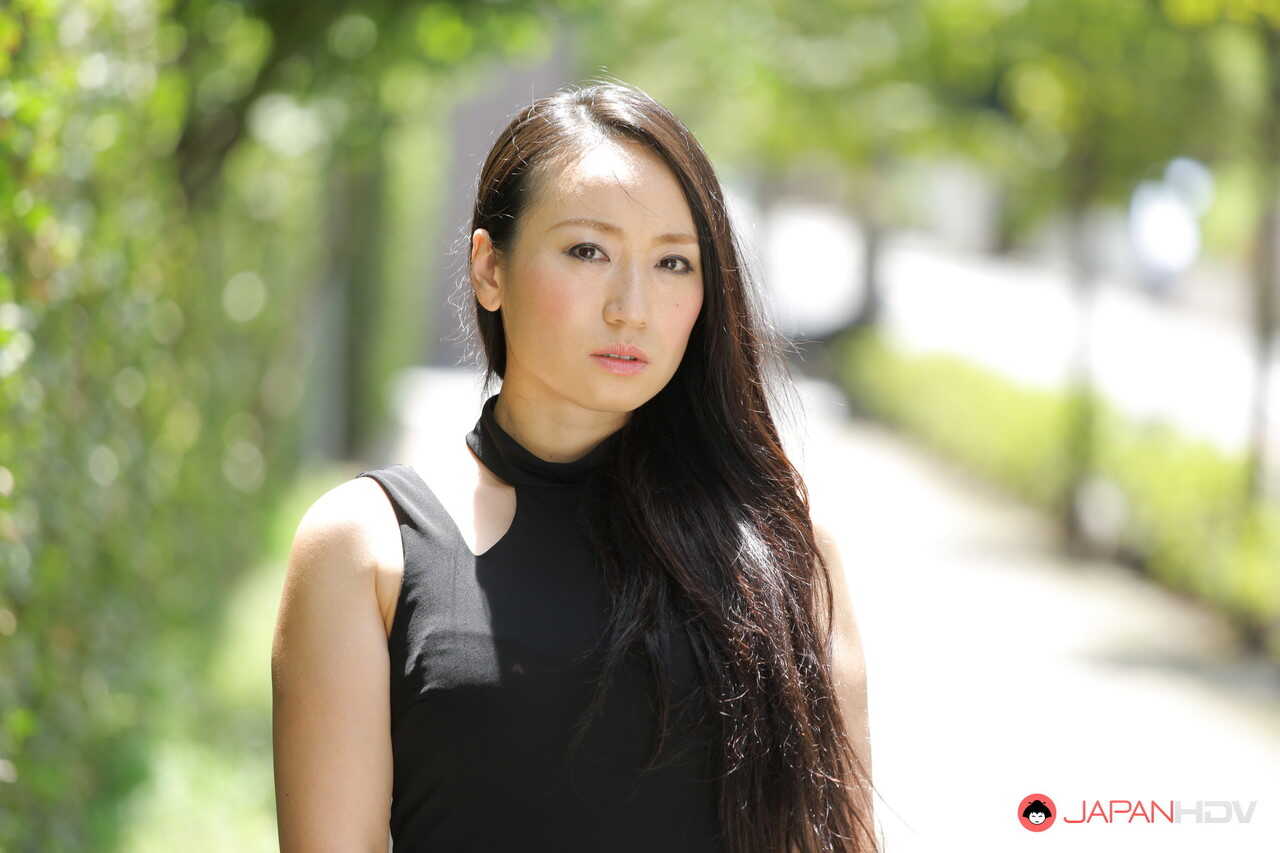 Public flashing with hot Japanese beauty Aya Shiina in a short black dress on a city street - Aya Shiina