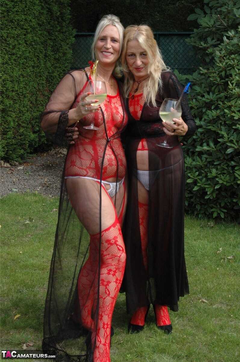 Nylon Goddess: Kyra's Older Blonde Women Share a Passionate Lesbian Kiss in the Backyard Setting - Kyras Nylons