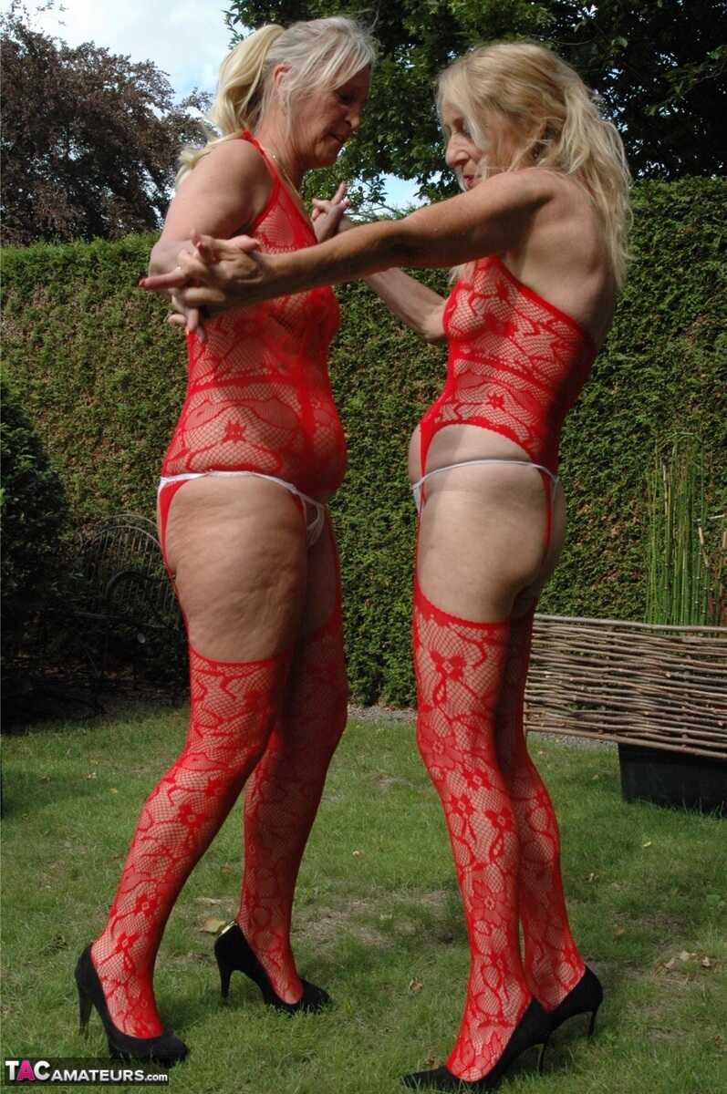 Nylon Goddess: Kyra's Older Blonde Women Share a Passionate Lesbian Kiss in the Backyard Setting - Kyras Nylons