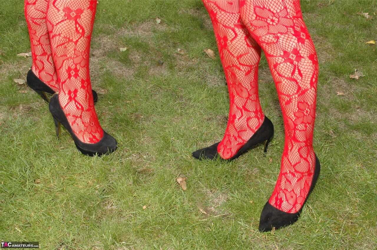 Nylon Goddess: Kyra's Older Blonde Women Share a Passionate Lesbian Kiss in the Backyard Setting - Kyras Nylons