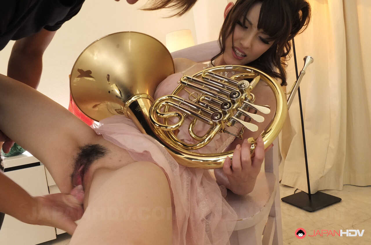 Japanese Girl Kanako Iioka Plays French Horn While Masturbating in a Hairy Upskirt