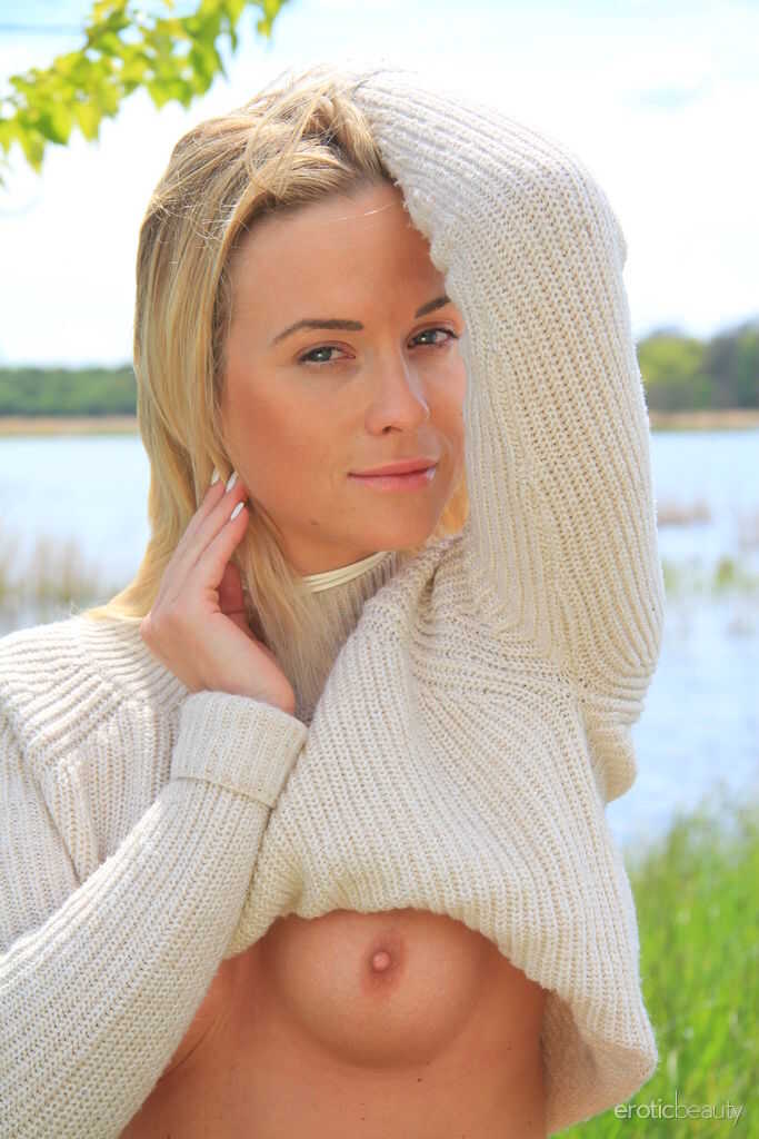 Blonde teen Cristal Caitlin shows her small tits and bald pussy near the water while her perfect ass is on display - Crist...