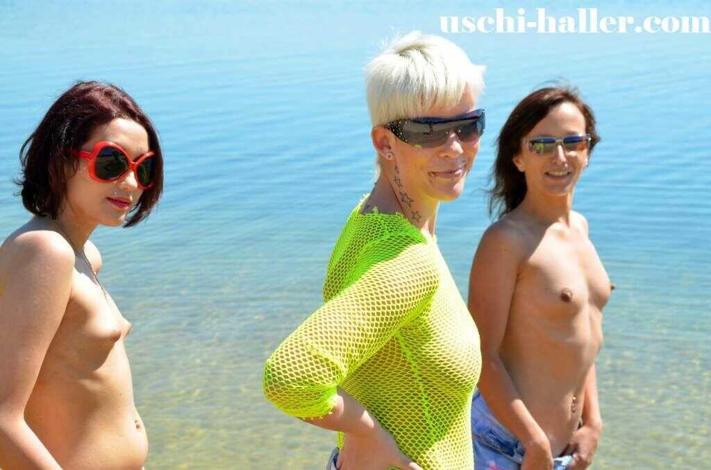 Sizzling Sands and Sun-Kissed Skin: Amateur Women Get Naked in the Water While Wearing Sunglasses at the Beach - Berichte,...
