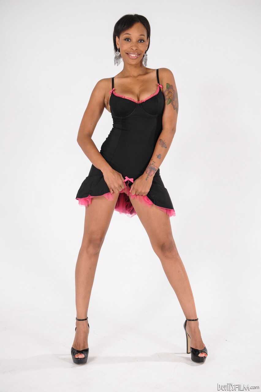 Busty ebony beauty Dior Love plays with her dildos while stripping off her lingerie - Dior Love