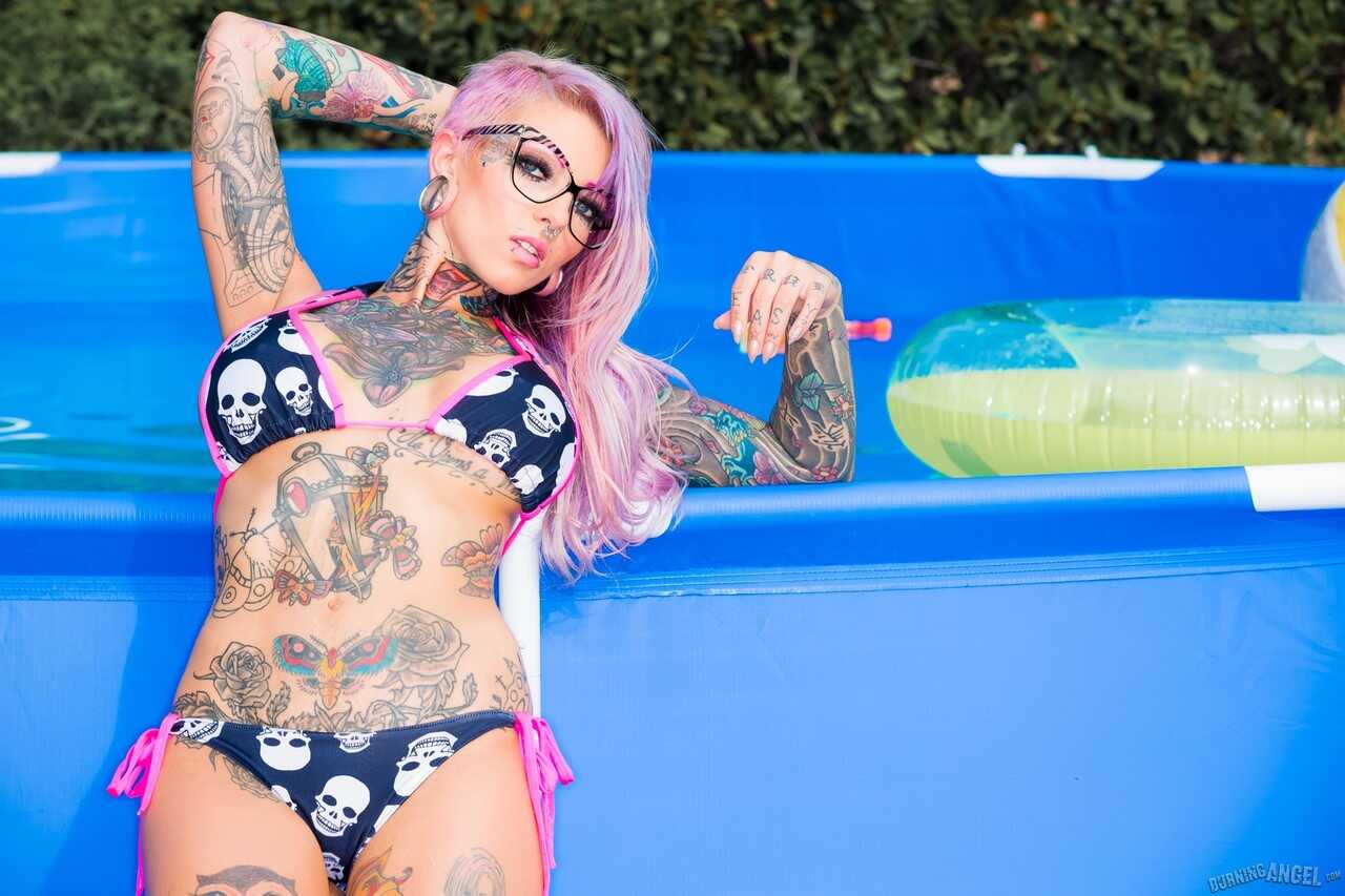 Tattooed bikini clad Sydnee Vicious in glasses spreading ass by the pool A Sexy Poolside Adventure - Sydnee Vicious