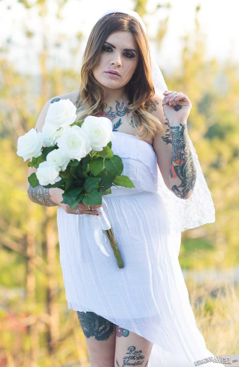 Fully tattooed Farrah Paws gets naked outside to show off body art & big boobs! - Farrah Paws