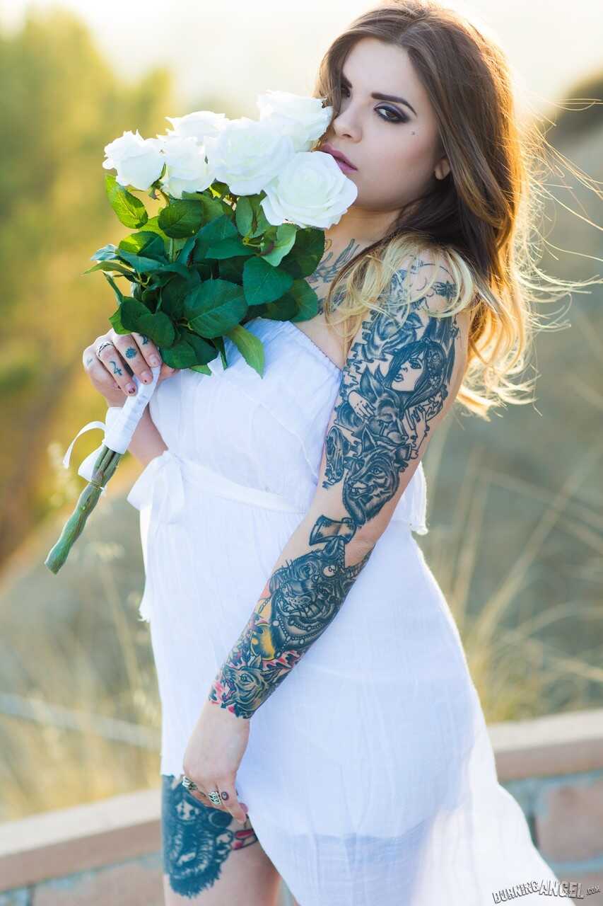 Fully tattooed Farrah Paws gets naked outside to show off body art & big boobs! - Farrah Paws