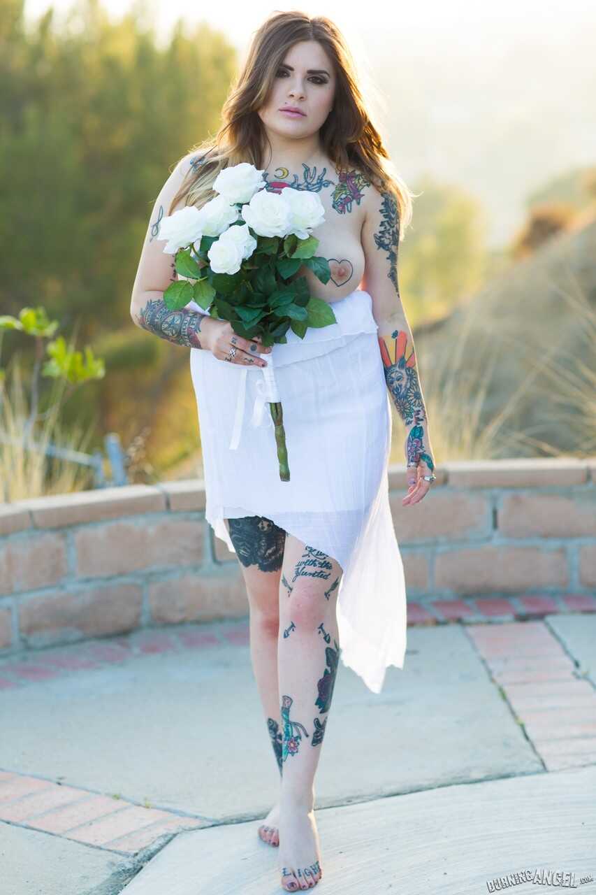 Fully tattooed Farrah Paws gets naked outside to show off body art & big boobs! - Farrah Paws