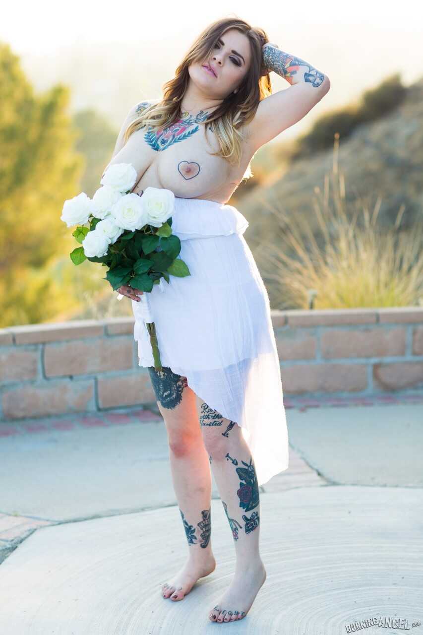 Fully tattooed Farrah Paws gets naked outside to show off body art & big boobs! - Farrah Paws
