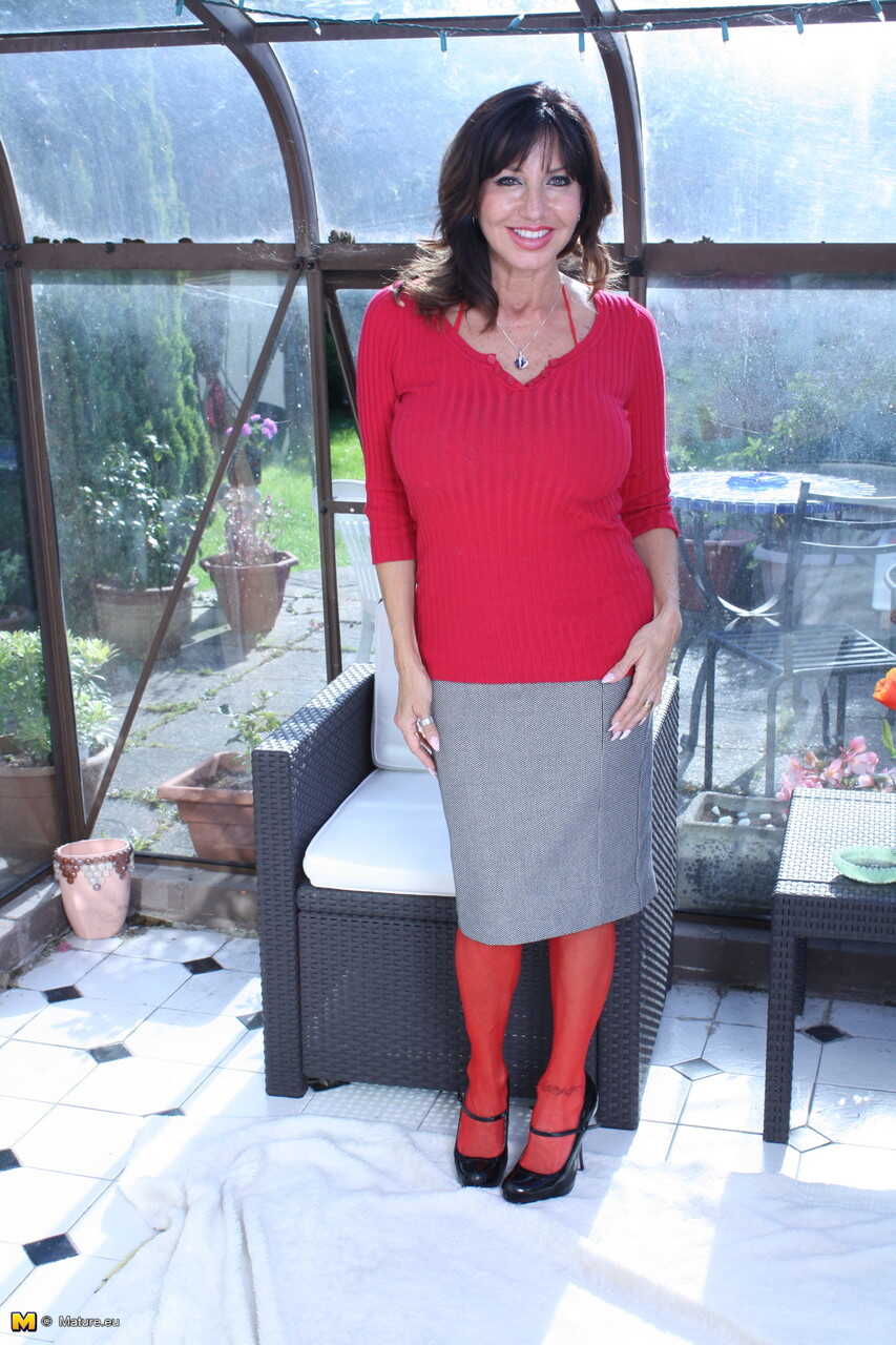 Mature mom Tara Holiday strips off her sweater and skirt to showcase her sexy lingerie and big tits for the camera - Tara ...