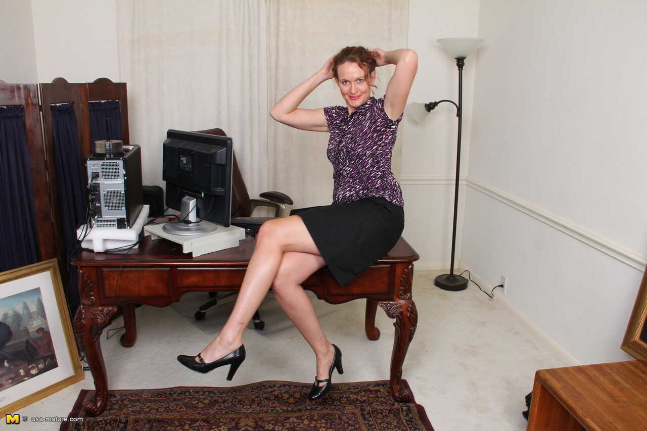 Middle-aged businesswoman takes off glasses and skirt on way to posing nude  Camille Johnson, Mature Solo, Mature Secretar...